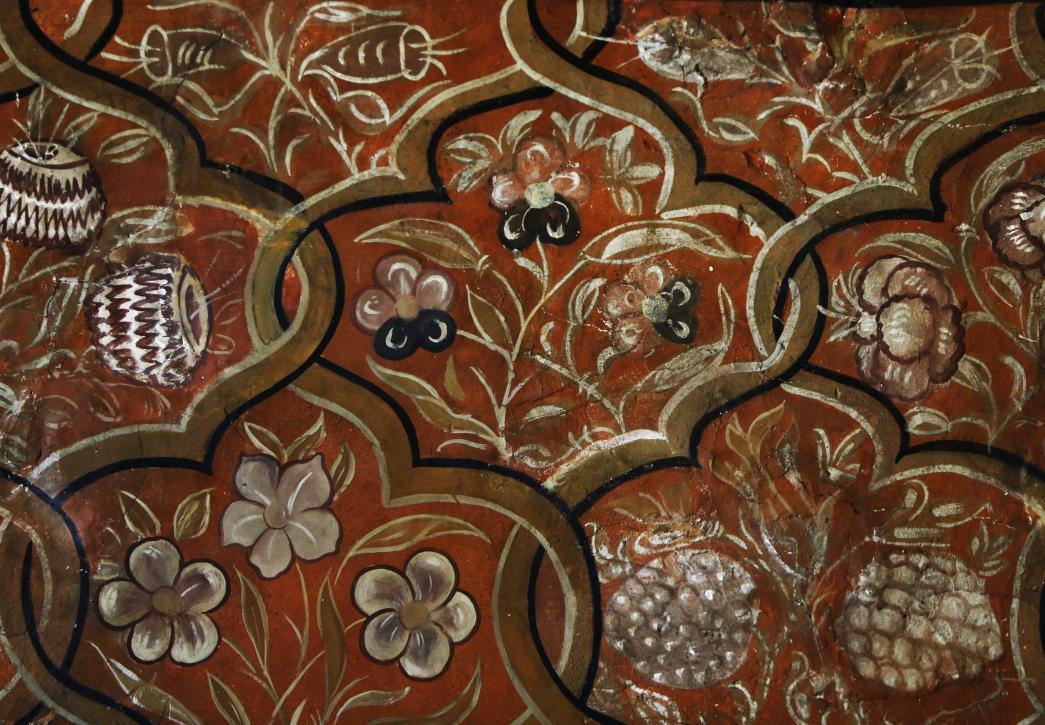 medieval wall painting with flower and fruit pattern
